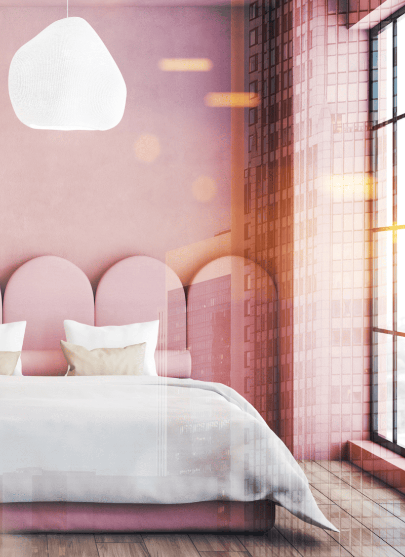 pink bedroom with a white bed