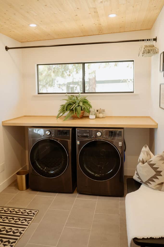 view into a laundry room with a washer and dryer unit