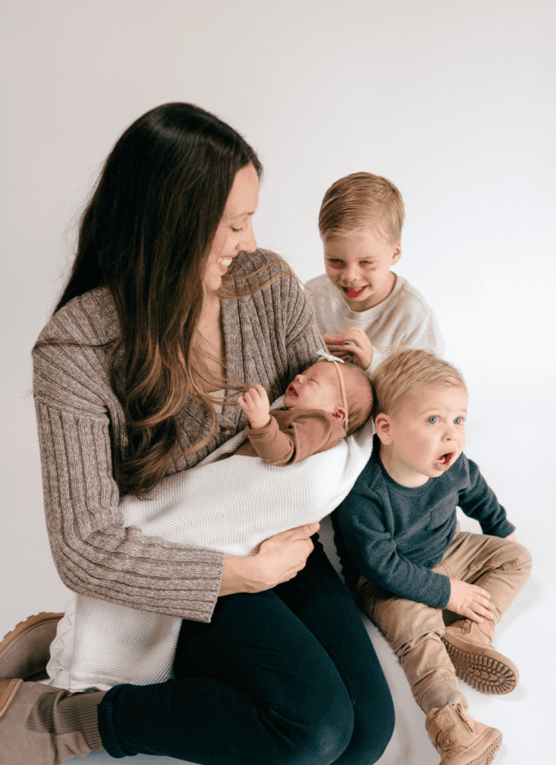 mom with her newborn and two toddlers